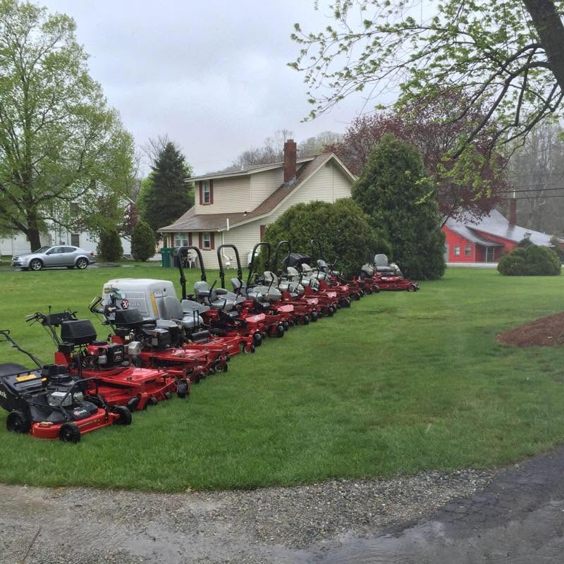 Caldwell Landscaping mower fleet lined up at the shop in Sussex, New Jersey
