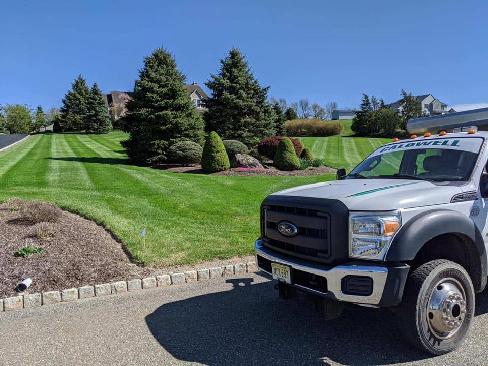 Caldwell Landscaping truck at a maintained property in Sussex, New Jersey